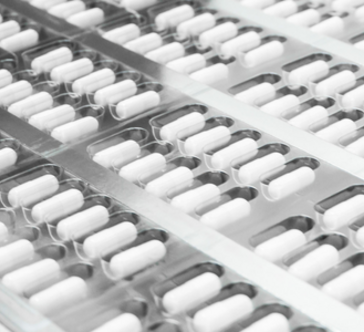 machinaal capsules verpakken